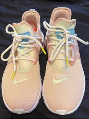 Nike Light Pink Mesh Sneakers with Yellow Accents